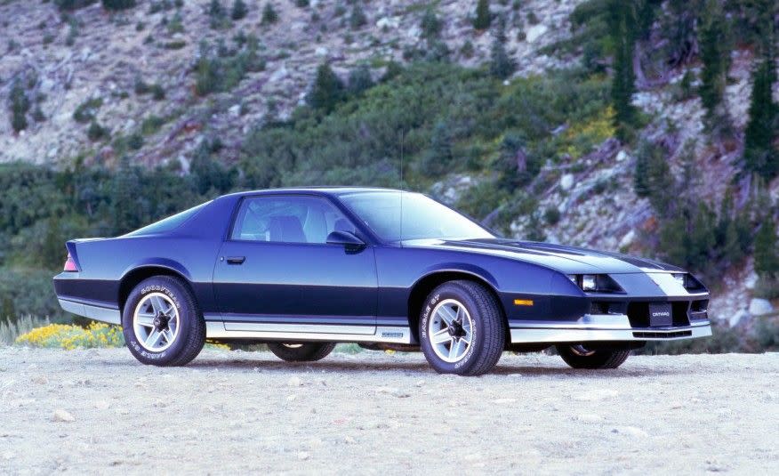 <p>Performance was returning to the Z28 by 1983 with the introduction of the 190-hp L69 version of the 5.0-liter V-8. While it still used a four-barrel carburetor, it was now available with a five-speed manual transmission. This is the '84 Camaro, which looked almost identical to the '82 and '83. GM's 700R4 four-speed automatic was optional on most Camaro models by '84.</p>