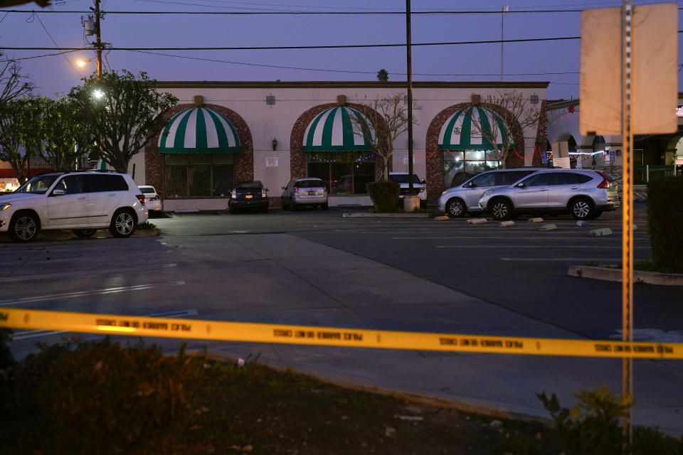 Police tape cordons off the Star Dance Studio in Monterey Park, Calif., Sunday, Jan. 22, 2023. A gunman killed multiple people at the ballroom dance studio late Saturday amid Lunar New Years celebrations in the predominantly Asian American community. (AP Photo/Jae C. Hong)