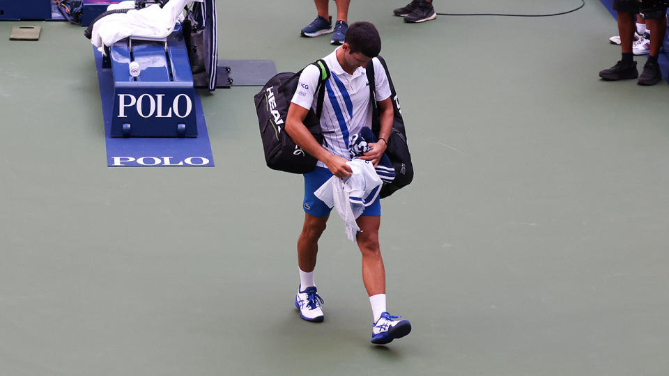 Novak Djokovic, pictured here walking off the court at the US Open after being defaulted.