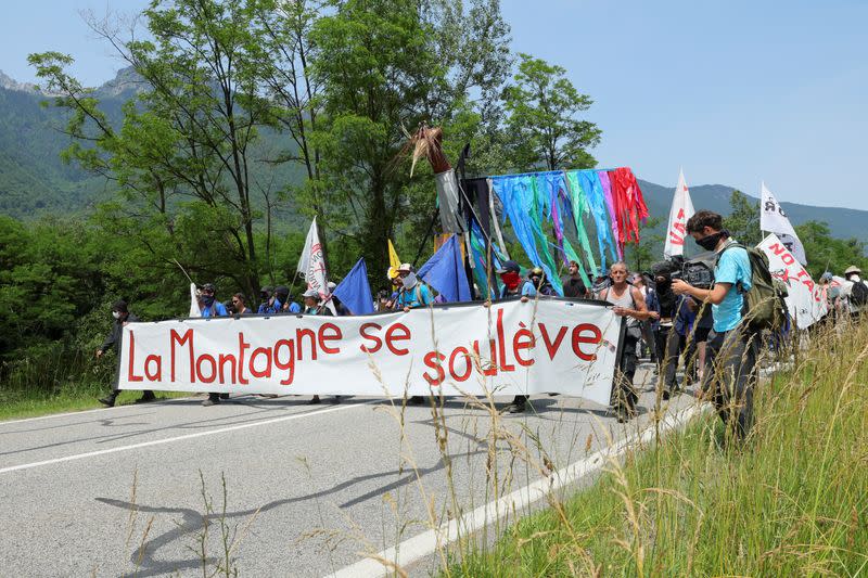 Activists take part in a protest against the Lyon-Turin rail link between France and Italy in La Chapelle