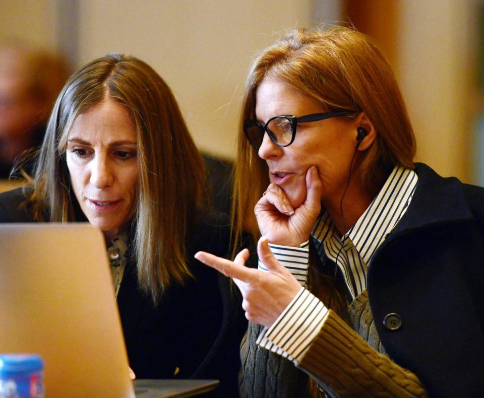 Defense attorney Audrey Felsen, left, and her client, Michelle Troconis, consult in court on day seven of Michelle Troconis' criminal trial at Connecticut Superior Court in Stamford (Hearst Connecticut Media)