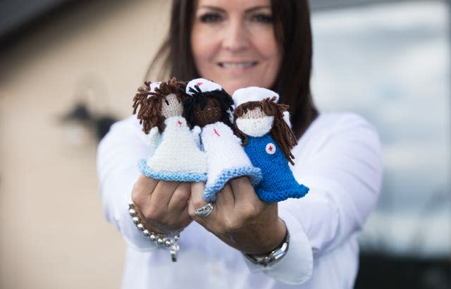 Debbie Goolding with her angel mascots 