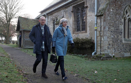 Britain's Prime Minister Theresa May and her husband Philip leave church, near High Wycombe, Britain, January 20, 2019. REUTERS/Hannah McKay