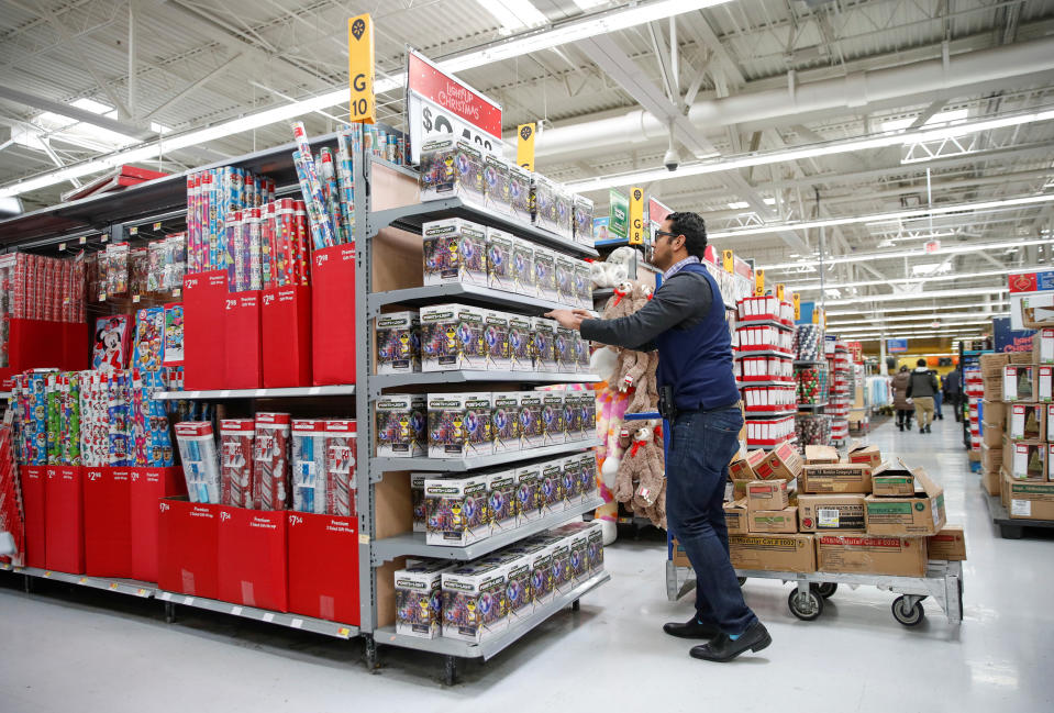 An employee works on a display ahead of Black Friday at a Walmart store in Chicago, Nov. 20, 2018. (Photo: Kamil Krzaczynski/Reuters)