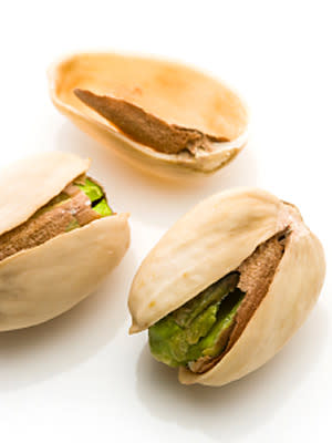 <div class="caption-credit"> Photo by: istock.com</div><b>Pistachios: The Skinniest Nut</b> <br> Pistachios are the most slimming nuts, with less than four calories each. Their shells make them especially dieting-friendly: "Eating them in the shell automatically slows down your pace so the snack lasts longer and you eat less overall," says Bauer. They may also help you breathe easier: University of Texas M. D. Anderson Cancer Center researchers found that eating two ounces of pistachios daily may reduce lung cancer risk. Pistachios are rich in the antioxidant gamma-tocopherol, a form of cancer-fighting vitamin E. Pistachios are also packed with potassium, a mineral essential for a healthy nervous system and muscles, and are a good source of vitamin B6, which can lift your mood, fortify your immune system, and more. <br> Serving info: About 50 nuts = 160 cals, 14 grams fat