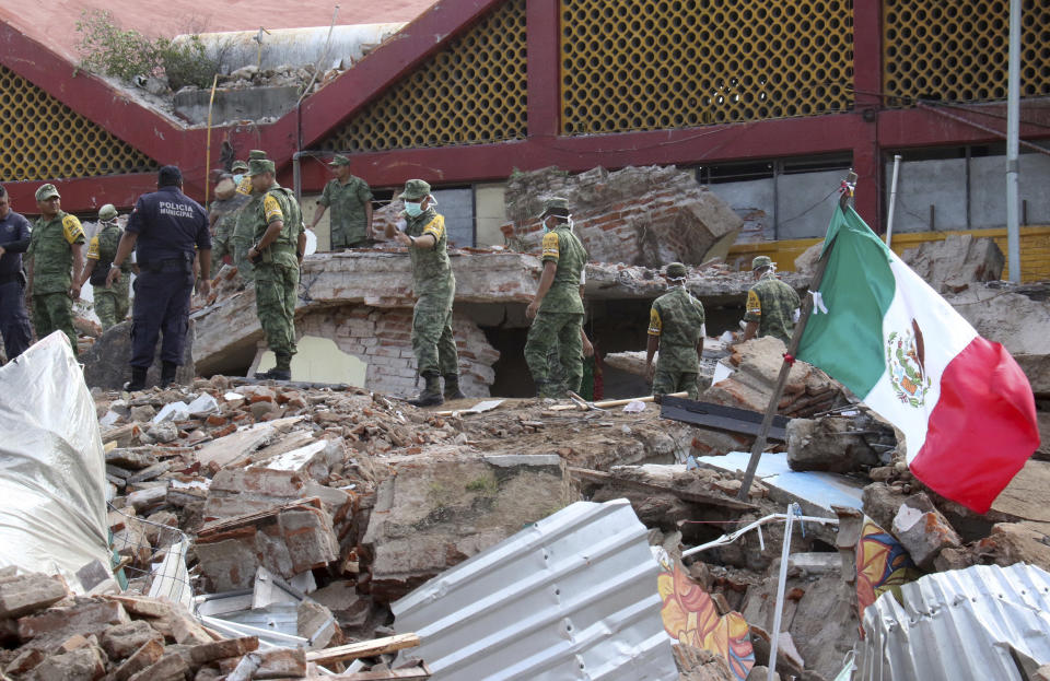 <p>Soldiers remove debris from a partly collapsed municipal building felled by a massive earthquake in Juchitan, Oaxaca state, Mexico, Friday, Sept. 8, 2017. One of the most powerful earthquakes ever to strike Mexico has hit off its southern Pacific coast, killing at least 32 people, toppling houses, government offices and businesses. (AP Photo/Luis Alberto Cruz) </p>