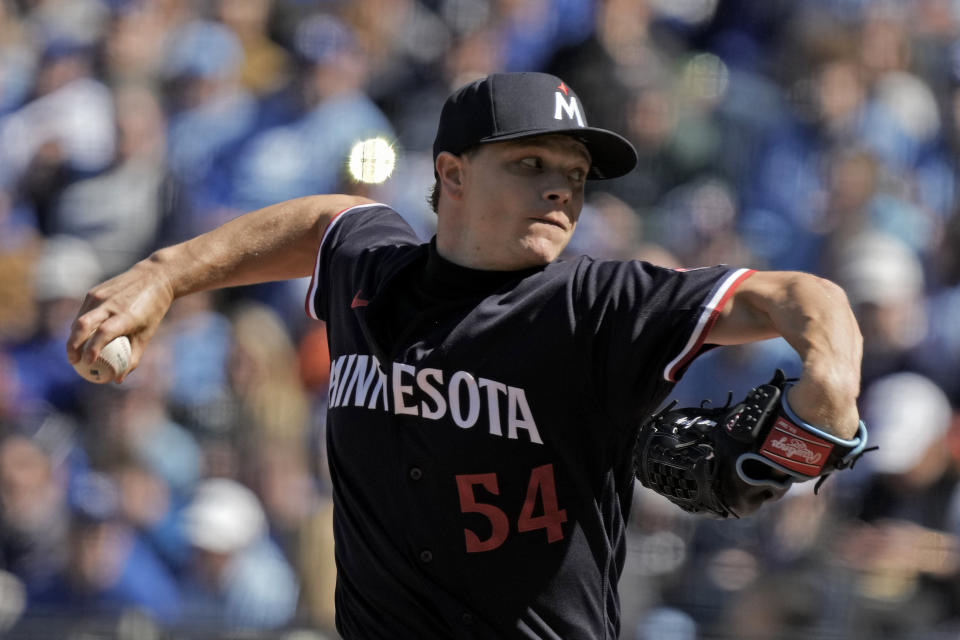 Minnesota Twins starting pitcher Sonny Gray throws during the first inning of a baseball game against the Kansas City Royals Saturday, April 1, 2023, in Kansas City, Mo. (AP Photo/Charlie Riedel)