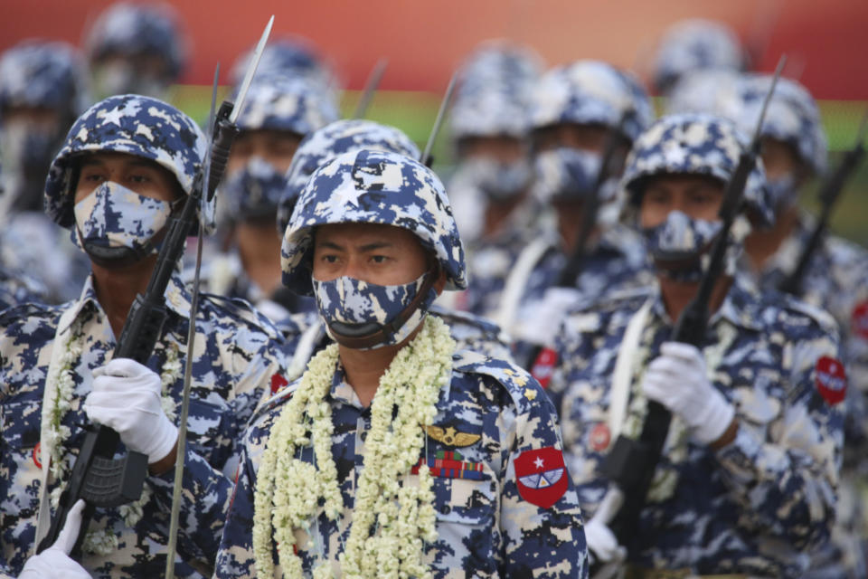 Military personnel participate in a parade on Armed Forces Day in Naypyitaw, Myanmar, Saturday, March 27, 2021. Military personnel participate in a parade on Armed Forces Day in Naypyitaw, Myanmar, Saturday, March 27, 2021. Senior Gen. Min Aung Hlaing, the head of Myanmar’s junta, on Saturday used the occasion of the country’s Armed Forces Day to try to justify the overthrow of the elected government of Aung San Suu Kyi, as protesters marked the holiday by calling for even bigger demonstrations. (AP Photo) (AP Photo)