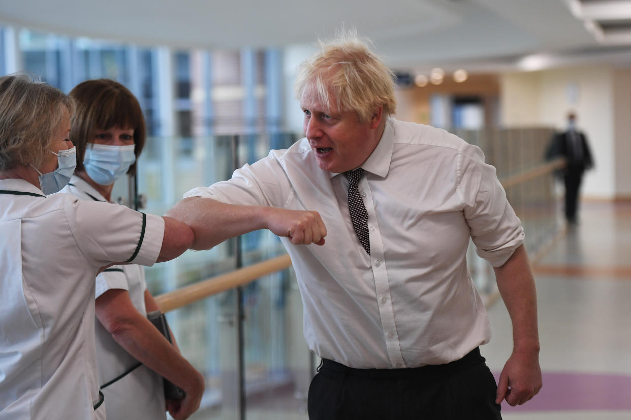 HEXHAM, ENGLAND - NOVEMBER 08: UK prime minister Boris Johnson meets with medical staff during a visit to Hexham General Hospital on November 8, 2021 in Hexham, England. (Photo by Peter Summers - WPA Pool/Getty Images)