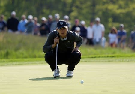 May 17, 2019; Bethpage, NY, USA; Jordan Spieth lines up his putt on the 12th green during the second round of the PGA Championship golf tournament at Bethpage State Park - Black Course. Mandatory Credit: Brad Penner-USA TODAY Sports