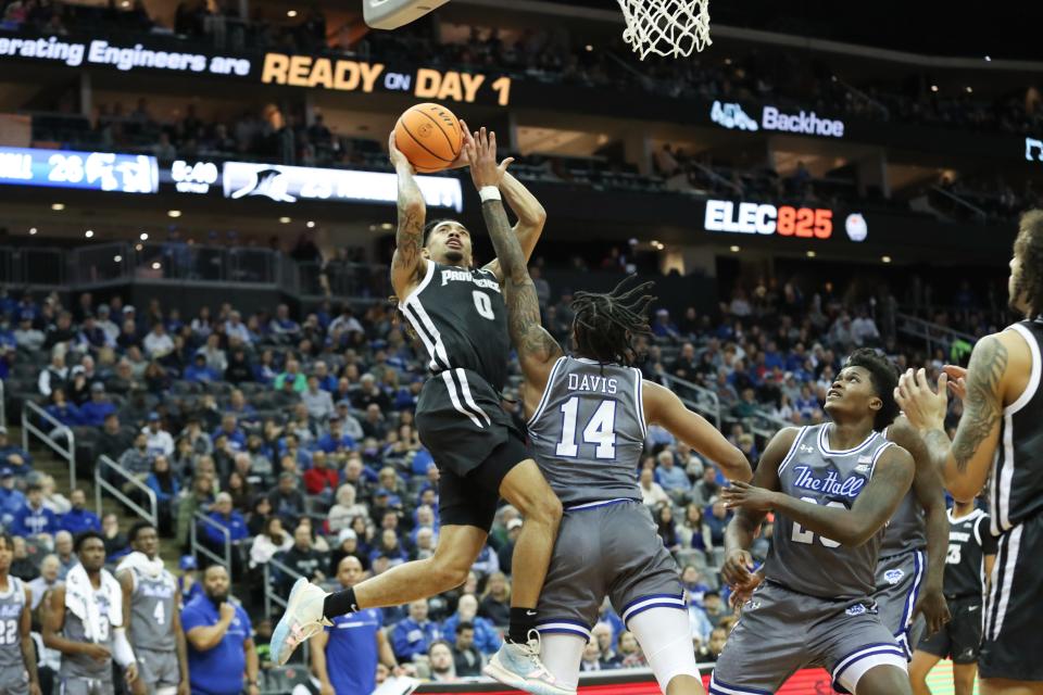 Providence Friars guard Alyn Breed (0) drives to the basket against Seton Hall Pirates guard Dre Davis (14) during the first half at Prudential Center.