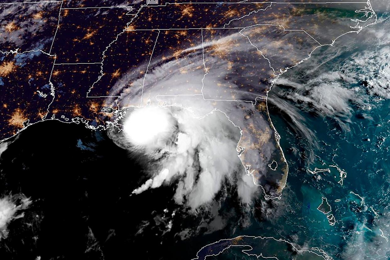 A satellite image from RAMMB/NOAA shows Hurricane Sally entering the US Gulf Coast on 15 September. (RAMMB/NOAA/NESDIS/AFP via Getty)