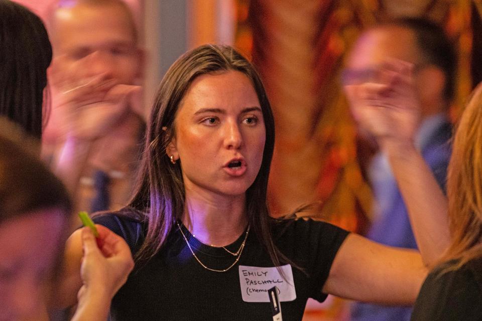 Emily Paschall, from The Chemours Co., networks at the start of the 2023 Top Workplaces Awards event held at The Queen in Wilmington on Wednesday, Oct. 4, 2023. The Chemours Co. won fifth place in the large company category.