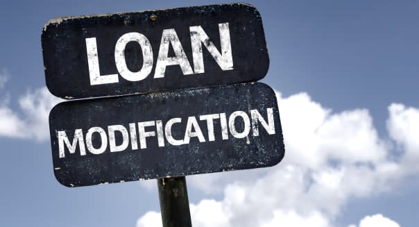 loan modification sign with...