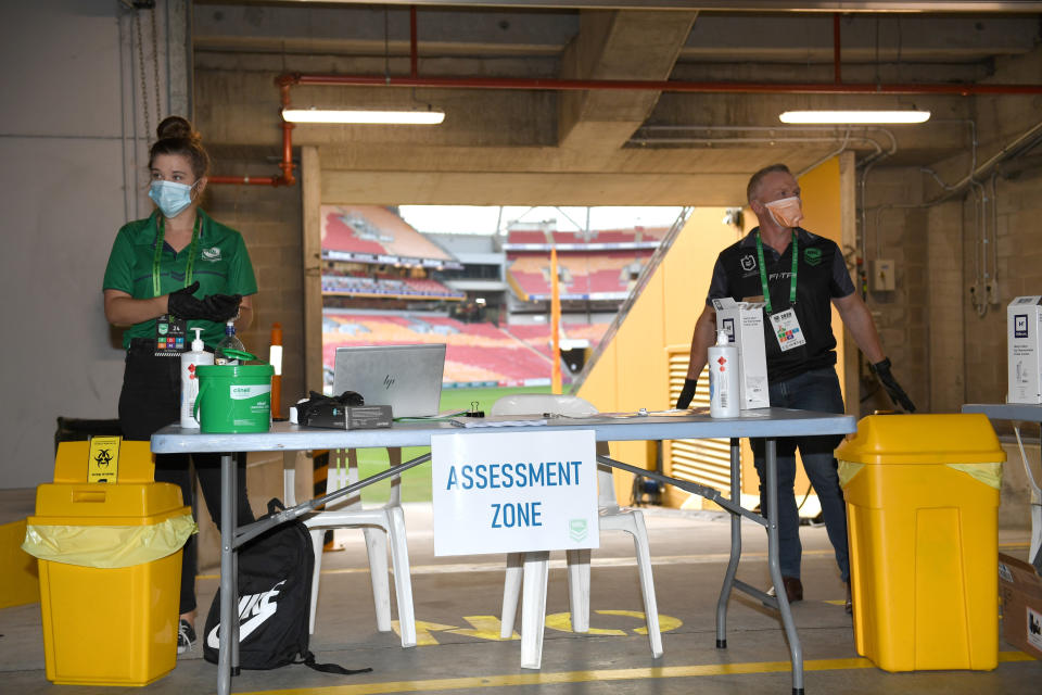 An area is set aside to test people arriving before the Brisbane Broncos and Parramatta Eels of the National Rugby League play, Thursday, May 28, 2020, in Brisbane, Australia. Two rounds of matches were played in the NRL in March before Australia and New Zealand went into lockdown and closed borders in a bid to slow the spread of COVID-19. (Scott Davis/NRL Photos via AP)