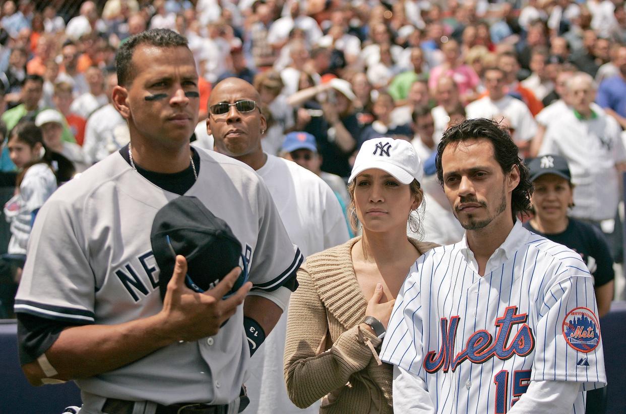 Actress Jennifer Lopez and husband Marc Anthony with New York Yankee Alex Rodriguez before a subway series game between the New York Mets and the New York Yankees at Shea Stadium in Queens, New York on Saturday May 21, 2005. The Mets beat the Yankees 7-1. (Photo by Mike Ehrmann/WireImage)