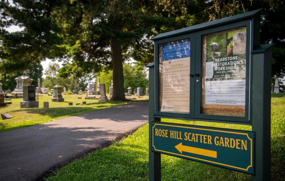 A sign directs visitors to the Rose Hill Cemetery Scatter Garden.