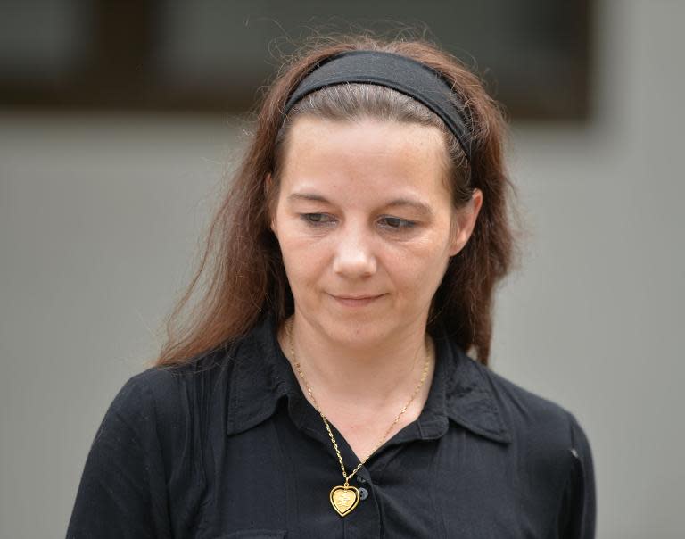 Sabine Atlaoui, wife of French death row prisoner Serge Atlaoui, arrives at Cilacap police outpost after visiting Nusakambang island prison on March 5, 2015