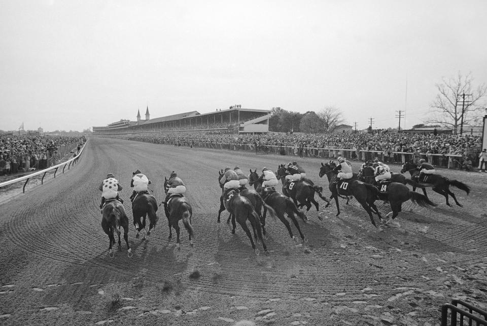 Secretariat, left, followed closely by Sham, right, are ahead of the pack at finish of the 99th Kentucky Derby at Churchill Downs Louisville KY., May 5, 1973. Secretariat, with Jockey Ron Turcotte up, ran the mile-and-a-quarter race in record time of 1:59.2, breaking previous record of two minutes. Our native (8, second from left) finished third. 