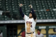 Houston Astros' George Springer celebrates after hitting a home run against the Arizona Diamondbacks during the fifth inning of a baseball game Friday, Sept. 18, 2020, in Houston. (AP Photo/David J. Phillip)