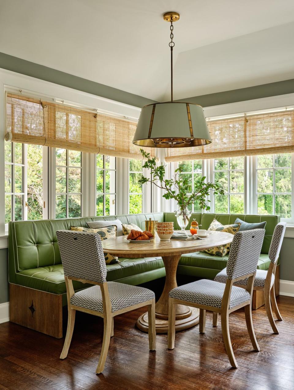 a dining room table with chairs around it