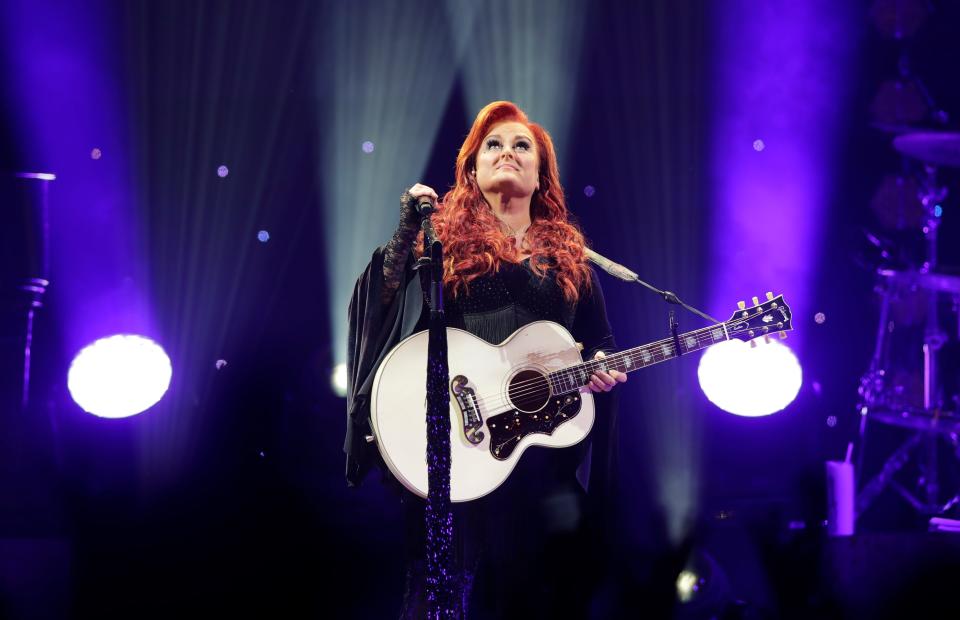 Wynonna Judd performs at the Resch Center during The Judds' The Final Tour concert Saturday in Ashwaubenon.