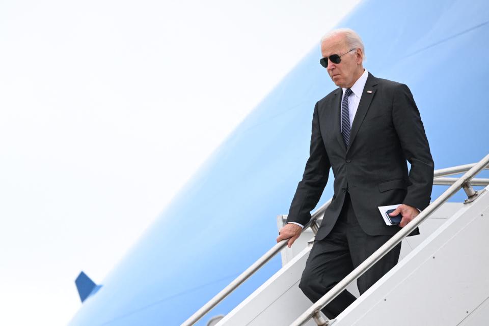 US President Joe Biden disembarks Air Force One at Boston Logan International Airport in Boston, Massachussetts, on September 12, 2022. - Biden is travelling to Boston to deliver remarks on his Bipartisan Infrastructure Law, as well as the Cancer Moonshot.