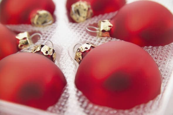 Red Christmas baubles --- Image by ï¿½ Creativ Studio Heinemann/Westend61/Corbis