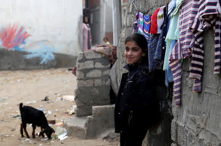 A young girl looks on front of her house in Egypt's Nile Delta village of El Shakhlub, in the province of Kafr el-Sheikh, Egypt May 5, 2019. Picture taken May 5, 2019. REUTERS/Hayam Adel