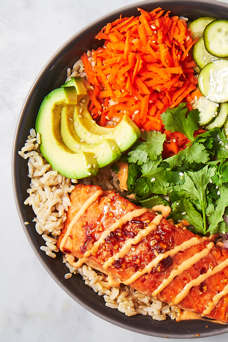 <p>There is something magical about grain bowls. This spicy salmon bowl has all of our favourite things, and is by far our favourite bowl to date.</p><p>Get the <a href="https://www.delish.com/uk/cooking/recipes/a29843921/spicy-salmon-bowl-recipe/" rel="nofollow noopener" target="_blank" data-ylk="slk:Spicy Salmon Bowl;elm:context_link;itc:0;sec:content-canvas" class="link ">Spicy Salmon Bowl</a> recipe.</p>
