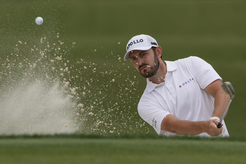 Patrick Cantlay hits from the bunker on the ninth hole during the final round of the RBC Heritage golf tournament, Sunday, April 21, 2024, in Hilton Head Island, S.C. (AP Photo/Chris Carlson)