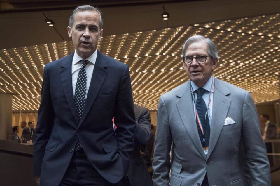Bank of England Governor Mark Carney, left, and Chairman of Bloomberg LP, Peter Grauer arrive at the Bank of England Markets Forum 2018 in central London (AFP/Getty Images)