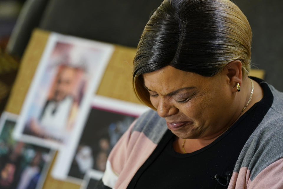 Penelope Scott pauses for a moment and bows her head as she talks about her son, De'vazia Turner, one of the victims killed in a mass shooting, during an interview with The Associate Press in Elk Grove, Calif., Monday, April 4, 2022. Multiple people were killed and injured in the shooting a day earlier.(AP Photo/Rich Pedroncelli)