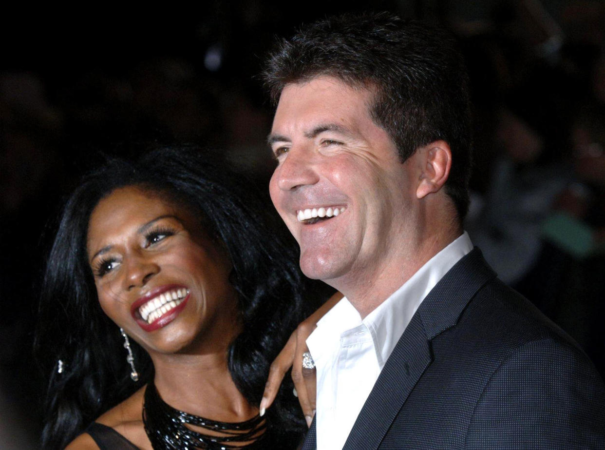 Sinitta with Simon Cowell during the National Television Awards 2005 (NTA), at the Royal Albert Hall, central London, Tuesday 25 October 2005. See PA story SHOWBIZ Awards. PRESS ASSOCIATION Photo. Photo credit should read: Steve Parsons/PA