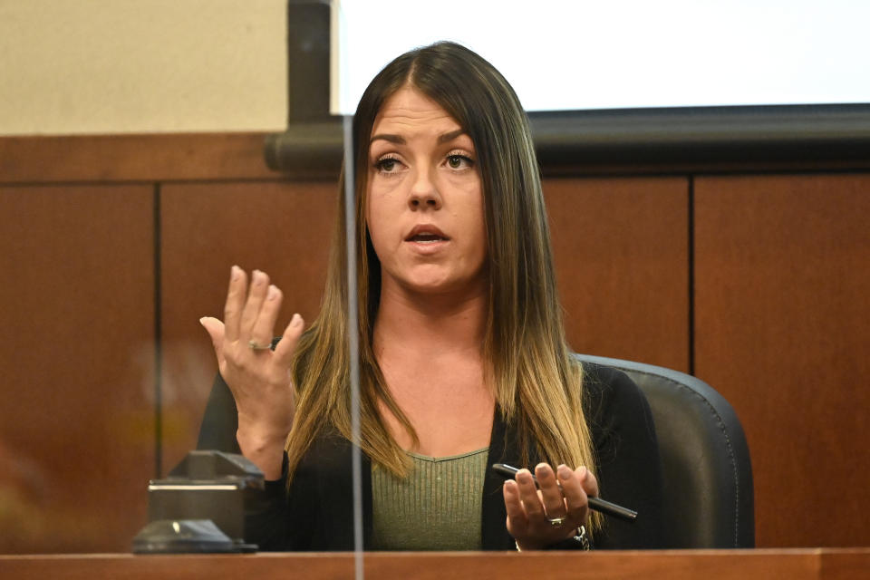 FILE - Chelsey Napper, the next door neighbor of Breonna Taylor, testifies during the trial of former Louisville police officer Brett Hankison, on March 1, 2022, in Louisville, Ky. Neighbors Napper and Cody Etherton are asking a judge to move their lawsuit out of Louisville because “fatigue” over the Taylor case could sway a jury in favor of the police. (AP Photo/Timothy D. Easley, Pool, File)