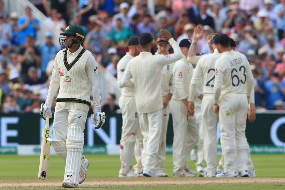 Australia's Usman Khawaja walks back to the pavilion. (Credit: Getty Images)