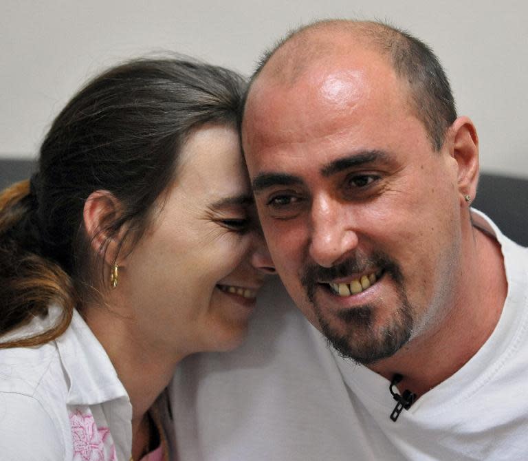 Serge Atlaoui (R), a Frenchman on death row in Indonesia, is seen with wife Sabine Atlaoui during a visit to Nusakambangan prison island in 2008