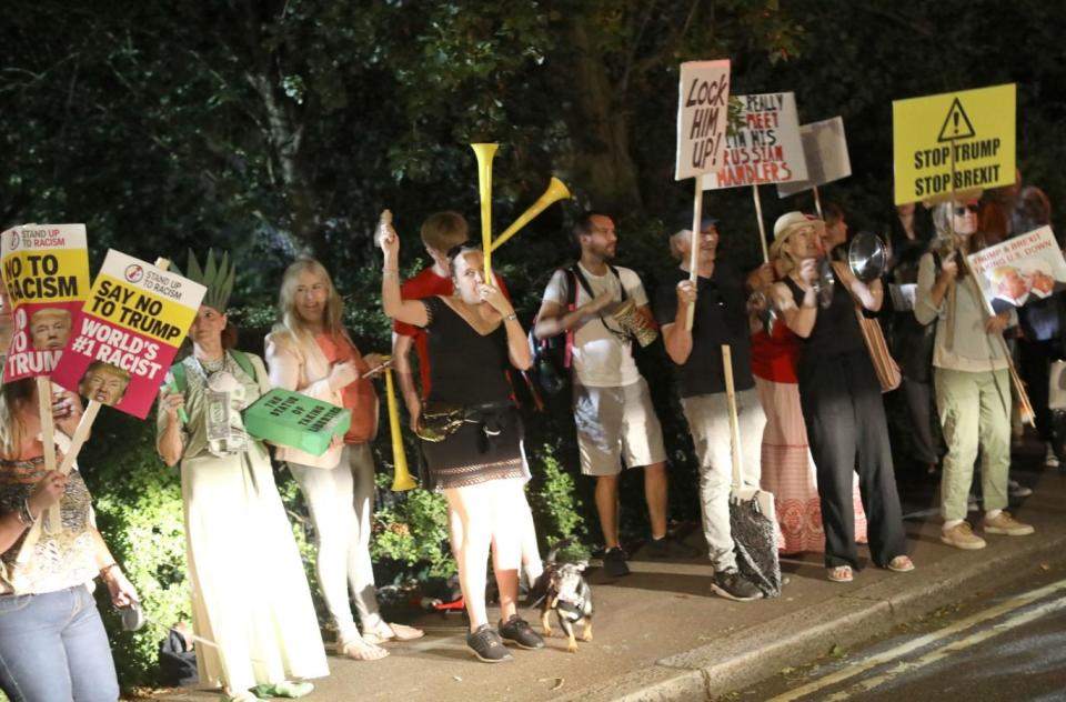 Demonstrators gather at the US ambassador residence in Regent's Park, London (PA)