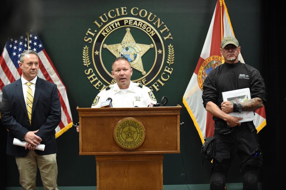 St. Lucie County Sheriff Keith Pearson (center) discusses accusations of an illegal animal slaughterhouse during a news conference alongside Capt. Troy Norman (left) and Richard Couto of Animal Rescue Mission, on Thursday, Feb. 15, 2024, at the St. Lucie County Sheriff’s Office.