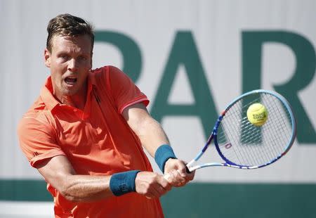 Tomas Berdych of the Czech Republic plays a shot to compatriot Radek Stepanek during their men's singles match at the French Open tennis tournament at the Roland Garros stadium in Paris, France, May 27, 2015. REUTERS/Pascal Rossignol