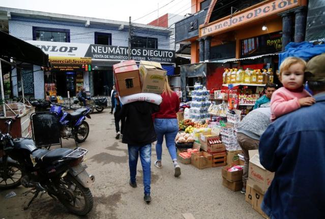 Argentina's 300% inflation and propped-up peso spawn Paraguay border ghost  town