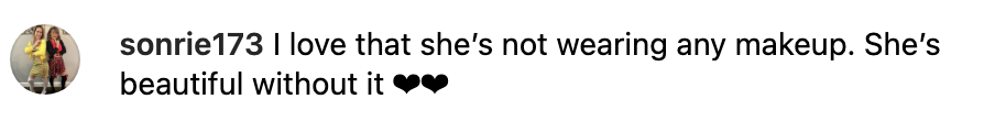 "I love that she's not wearing any makeup; she's beautiful without it [two black heart emojis]"