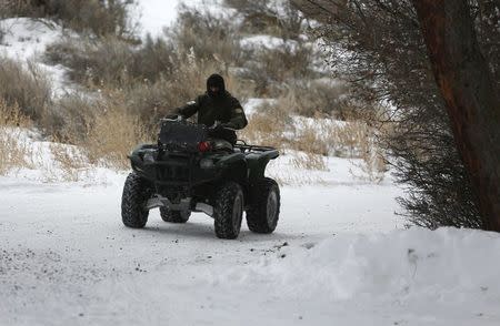 An occupier rides an ATV at the Malheur National Wildlife Refuge near Burns, Oregon, January 10, 2016. REUTERS/Jim Urquhart