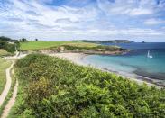 <p>There's no need to pack some soggy sandwiches and a flask of lukewarm tea when you visit Porthcurnick because one of Cornwall's foodie gems is situated just metres from the shore.</p><p><a href="https://www.hiddenhut.co.uk/" rel="nofollow noopener" target="_blank" data-ylk="slk:The Hidden Hut;elm:context_link;itc:0;sec:content-canvas" class="link ">The Hidden Hut</a> attracts locals and holidaymakers alike with its daily changing menu of delicious soups and stews, fresh salads and seafood and, of course, hot Cornish pasties.</p>