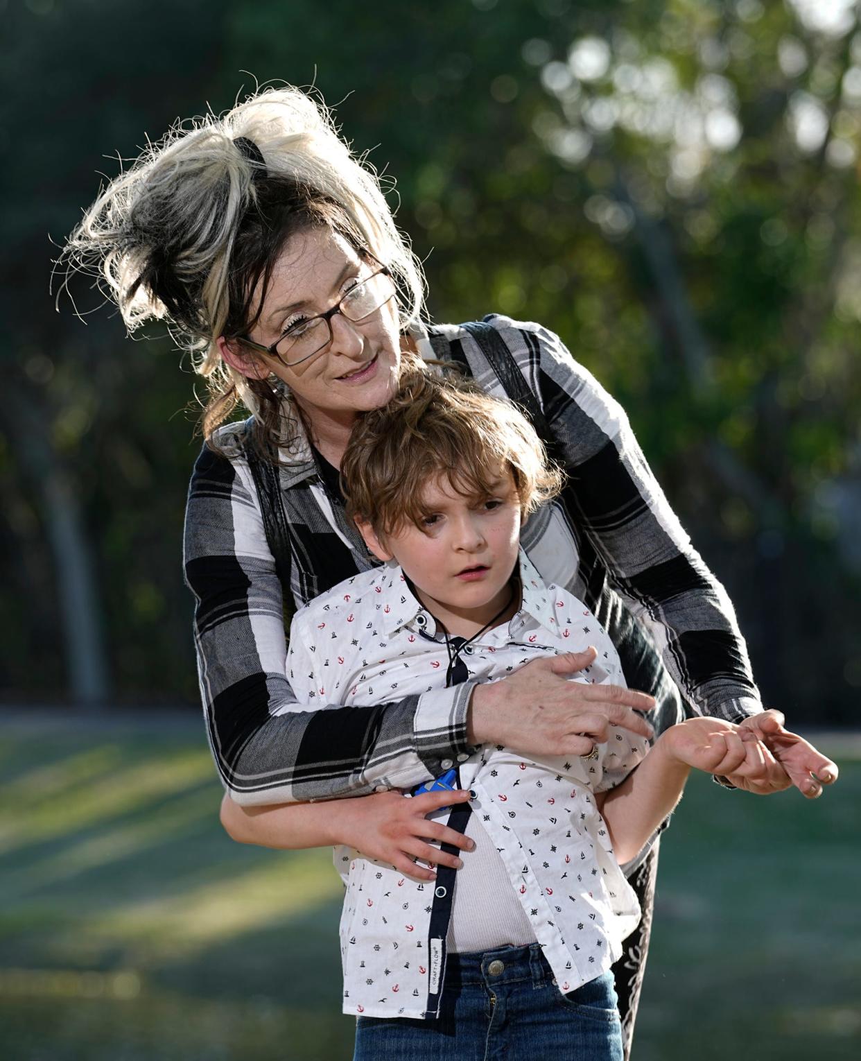 Tiffany Clark with her son, Kylhar, 7, in Daytona Beach, Tuesday, Feb.22, 2022.