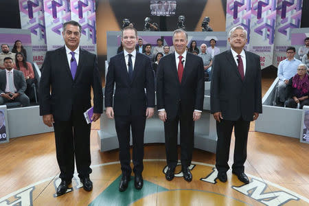 (L-R) Independent candidate Jaime Rodriguez Calderon, Ricardo Anaya of the National Action Party (PAN), Jose Antonio Meade of the Institutional Revolutionary Party (PRI) and Andres Manuel Lopez Obrador of the National Regeneration Movement (MORENA) pose for a photo in their second televised debate in Tijuana, Mexico in this May 20, 2018 handout released to Reuters by the National Electoral Institute (INE). National Electoral Institute/Handout via REUTERS