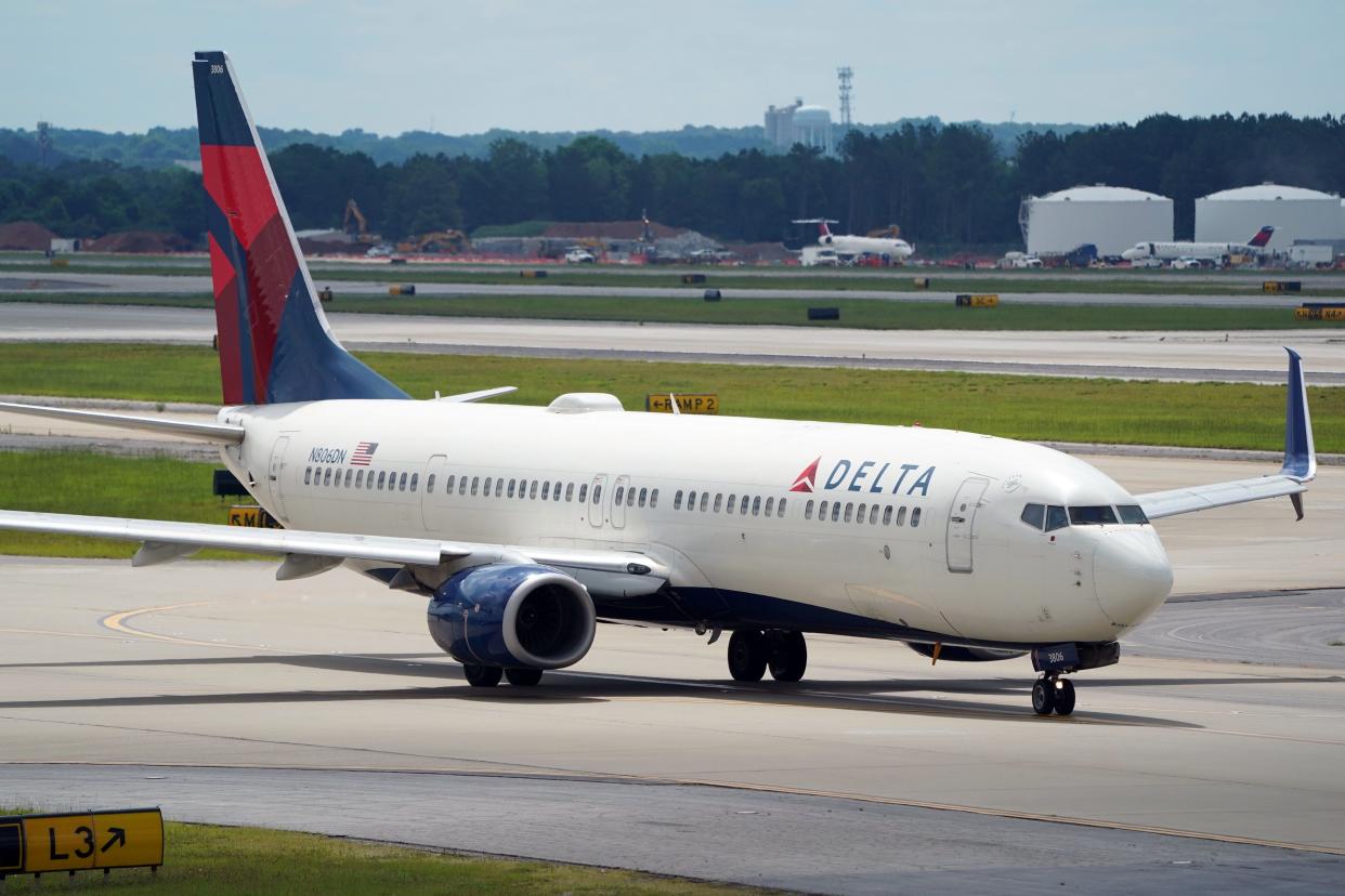 A Delta 737-900ER taxis to the runway of Hartsfield-Jackson International Airport on June 30, 2022.