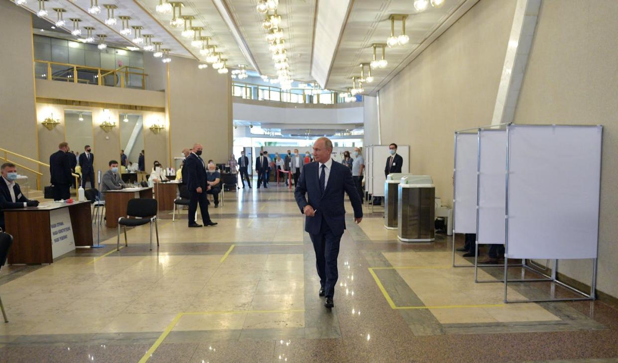 <span class="caption">Russian President Vladimir Putin at a polling station to cast his ballot in a nationwide vote on constitutional reforms in Moscow on July 1, 2020. </span> <span class="attribution"><a class="link " href="https://www.gettyimages.com/detail/news-photo/russian-president-vladimir-putin-walks-at-a-polling-station-news-photo/1223720453?adppopup=true" rel="nofollow noopener" target="_blank" data-ylk="slk:Alexey Druzhinin/SPUTNIK/AFP via Getty Images);elm:context_link;itc:0;sec:content-canvas">Alexey Druzhinin/SPUTNIK/AFP via Getty Images)</a></span>