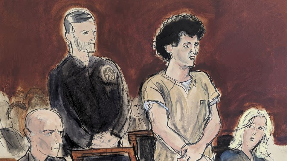 In this courtroom sketch, Sam Bankman-Fried, second from right, stands while making a statement during his sentencing in Manhattan federal court on March 28, 2024. - Elizabeth Williams/AP
