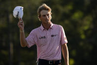 Will Zalatoris tips his cap after putting on the 18th hole during the final round of the Masters golf tournament on Sunday, April 11, 2021, in Augusta, Ga. (AP Photo/David J. Phillip)